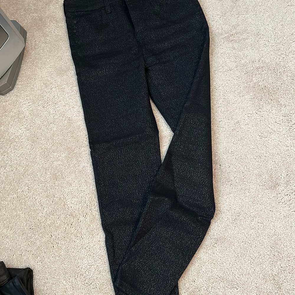 Very dressy high rise black jeans.